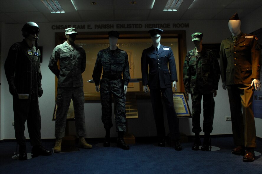 Statues with present and past Air Force uniforms stand as static displays in the Ramstein Air Base Enlisted Heritage Hall Jan. 6, 2009. (U.S. Air Force photo by Airman 1st Class Kenny Holston)
