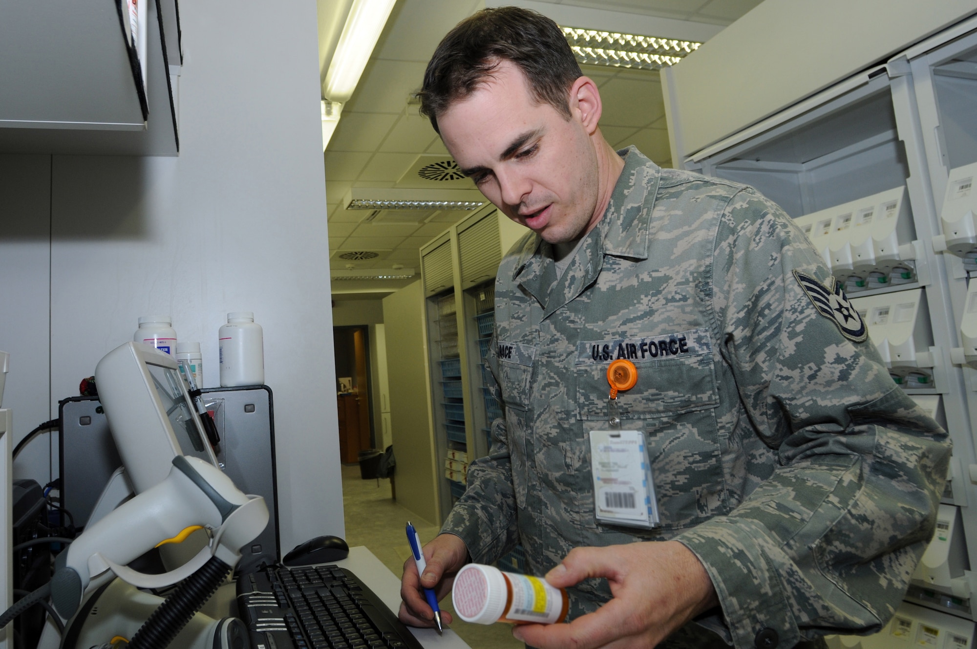 Staff Sgt. Joe Race, 435th Medical Operations Squadron pharmacy technician, fills a prescription at Ramstein Air Base Jan. 6, 2009. The Ramstein pharmacy fills an average of 115,000 prescriptions a year and is the second busiest pharmacy in U.S. Air Forces in Europe. (U.S. Air Force photo by Senior Airman Kelly LeGuillon)