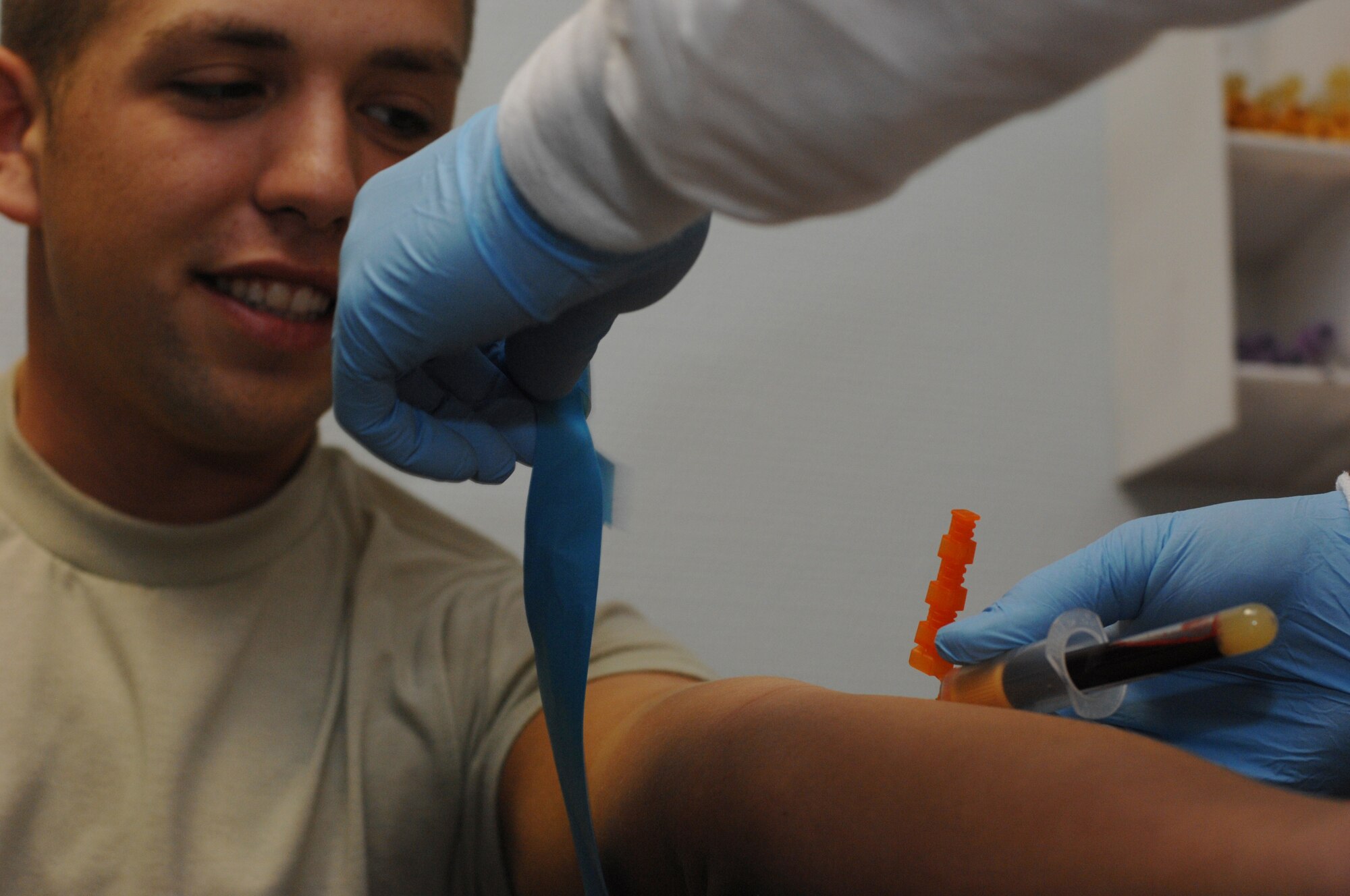 Airman 1st Class Derick Lyell, 435th Civil Engineer Squadron, gives a blood sample at the laboratory at Ramstein Air Base Jan. 6, 2009. The laboratory keeps a blood sample on file for service members deploying out of Ramstein. (U.S. Air Force photo by Senior Airman Amber Bressler)