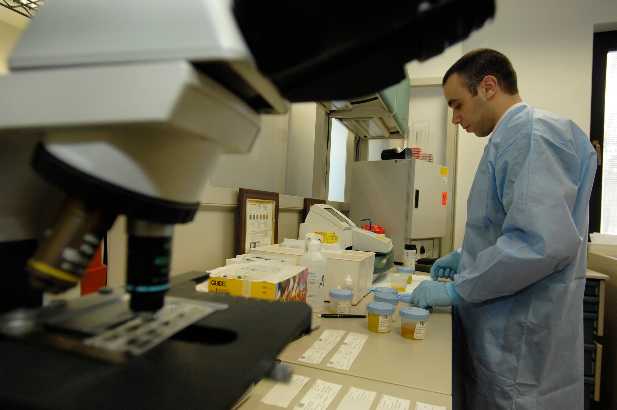 Tech. Sgt. Christopher Arbona, 435th Medical Support Squadron medical laboratory journeyman, tests urine samples for bacteria at Ramstein Air Base Jan. 6, 2009. (U.S. Air Force photo by Senior Airman Amber Bressler)