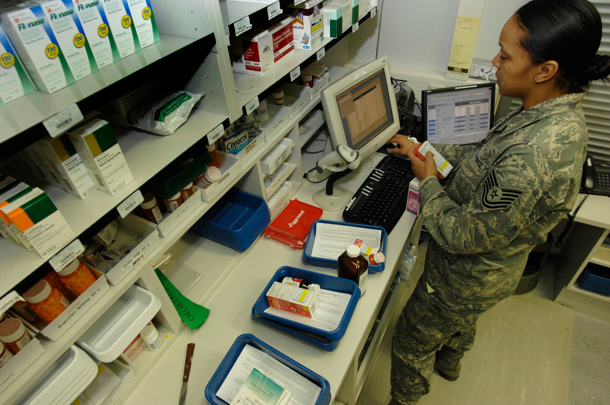 Tech. Sgt. June White, 435th Medical Operations Squadron pharmacy technician, fills prescriptions for customers at Ramstein Air Base Jan. 6, 2009. The Ramstein pharmacy fills 115,000 prescriptions a year and is the second busiest pharmacy within the U.S. Air Forces in Europe. (U.S. Air Force photo by Senior Airman Amber Bressler)