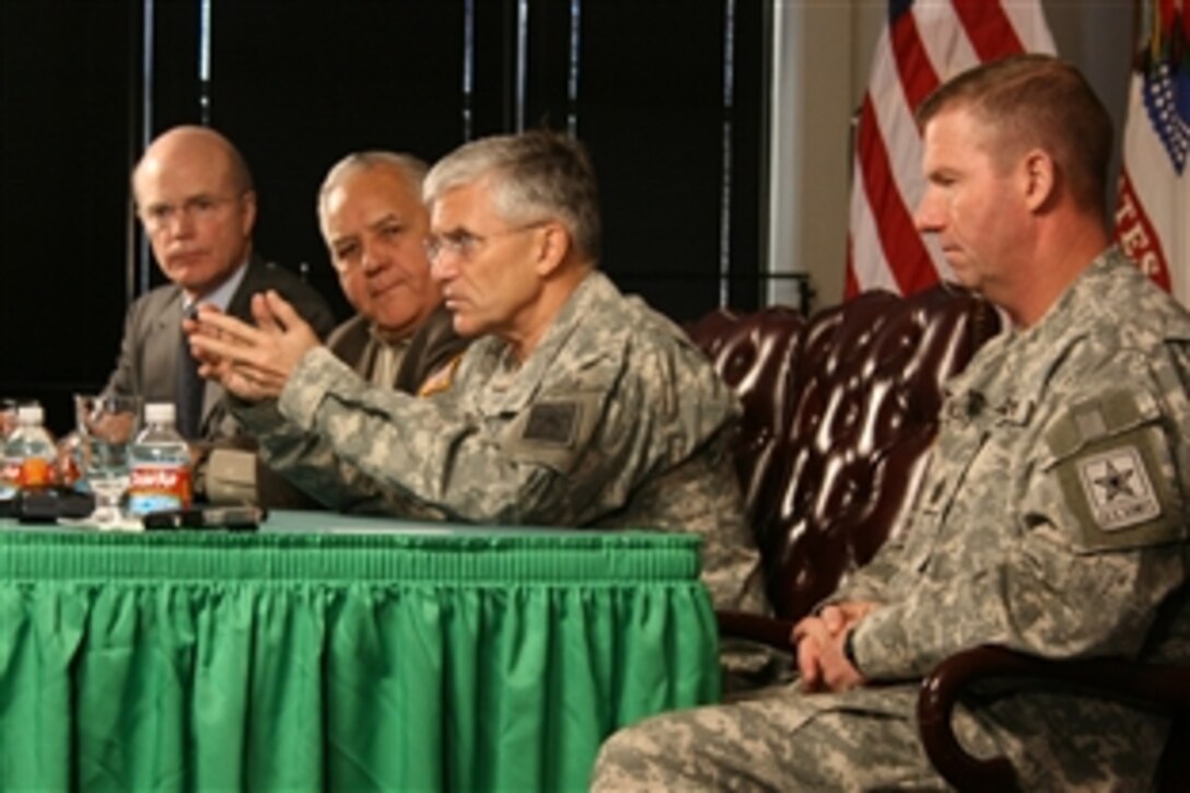 Army Secretary Pete Geren, left, U.S. Congressman Silvestre Reyes, second from left, Chief of Staff of the Army Gen. George W. Casey Jr., right  and Sergeant Major of the Army Kenneth O. Preston, far right,  announce the Year of the Noncommissioned Officer during a press conference, Jan. 5, 2009, at the Sergeants Major Academy, Fort Bliss, Texas. 