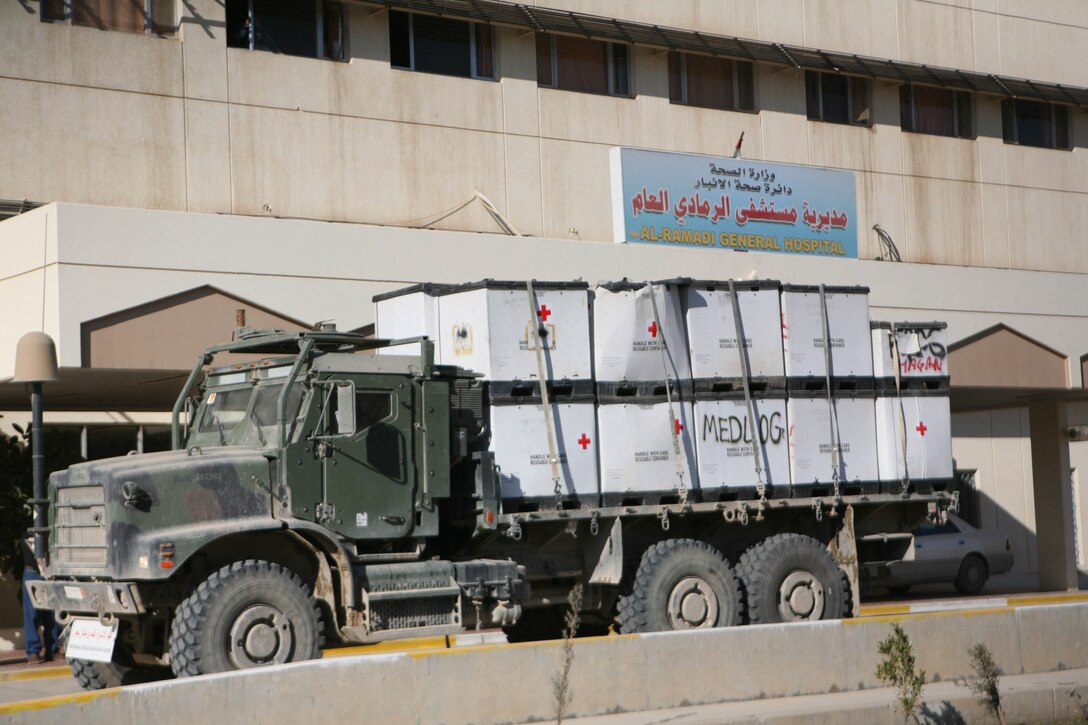 A truck carrying hospital supplies sits outside Ramadi General Hospital, Jan. 7. Service members at Camp Ramadi, Iraq, toured the hospital and donated 20 crates of medical supplies including oxygen masks, IV bags and mass casualty equipment.