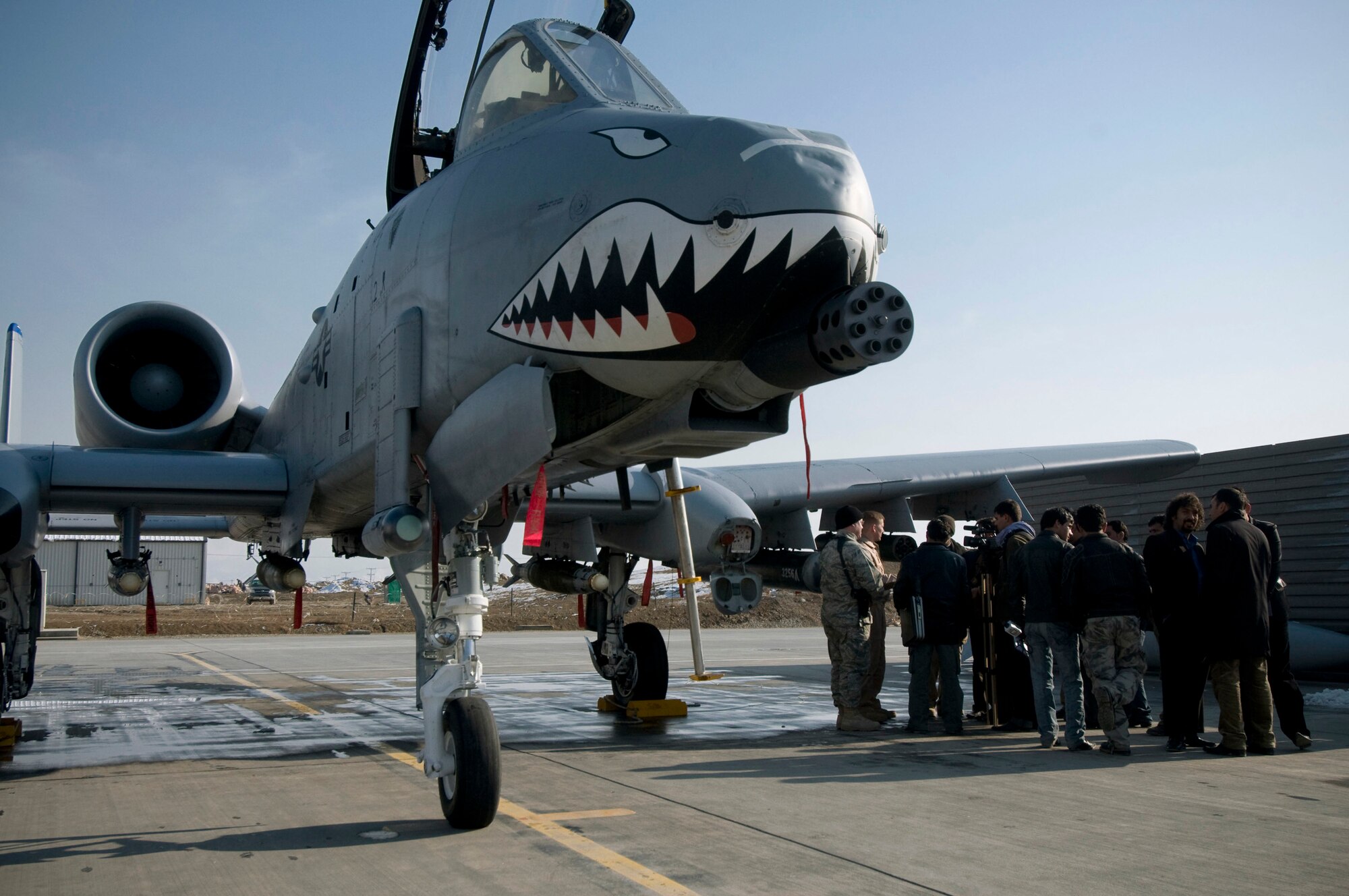 Members of local news agencies are shown around an A-10 Thunderbolt II during Afghan Media Day Jan. 5 at Bagram Airfield, Afghanistan. (U.S. Air Force photo/Staff Sgt. Samuel Morse)
