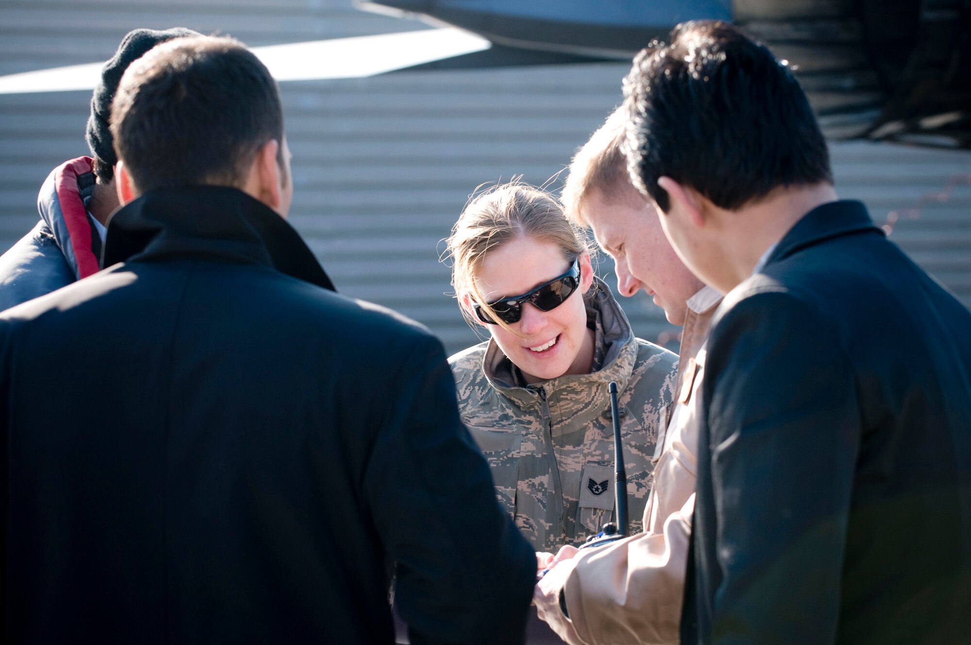 Staff Sgt. Rachel Martinez provides guidance during an interview between Lt. Col. Derek Oaks and members of the Afghan media Jan. 5 at Bagram Airfield, Afghanistan. Sergeant Martinez is a 455th Air Expeditionary Wing public affairs specialist. Colonel Oaks is an A-10 Thunderbolt II pilot. (U.S. Air Force photo/Staff Sgt. Samuel Morse)
