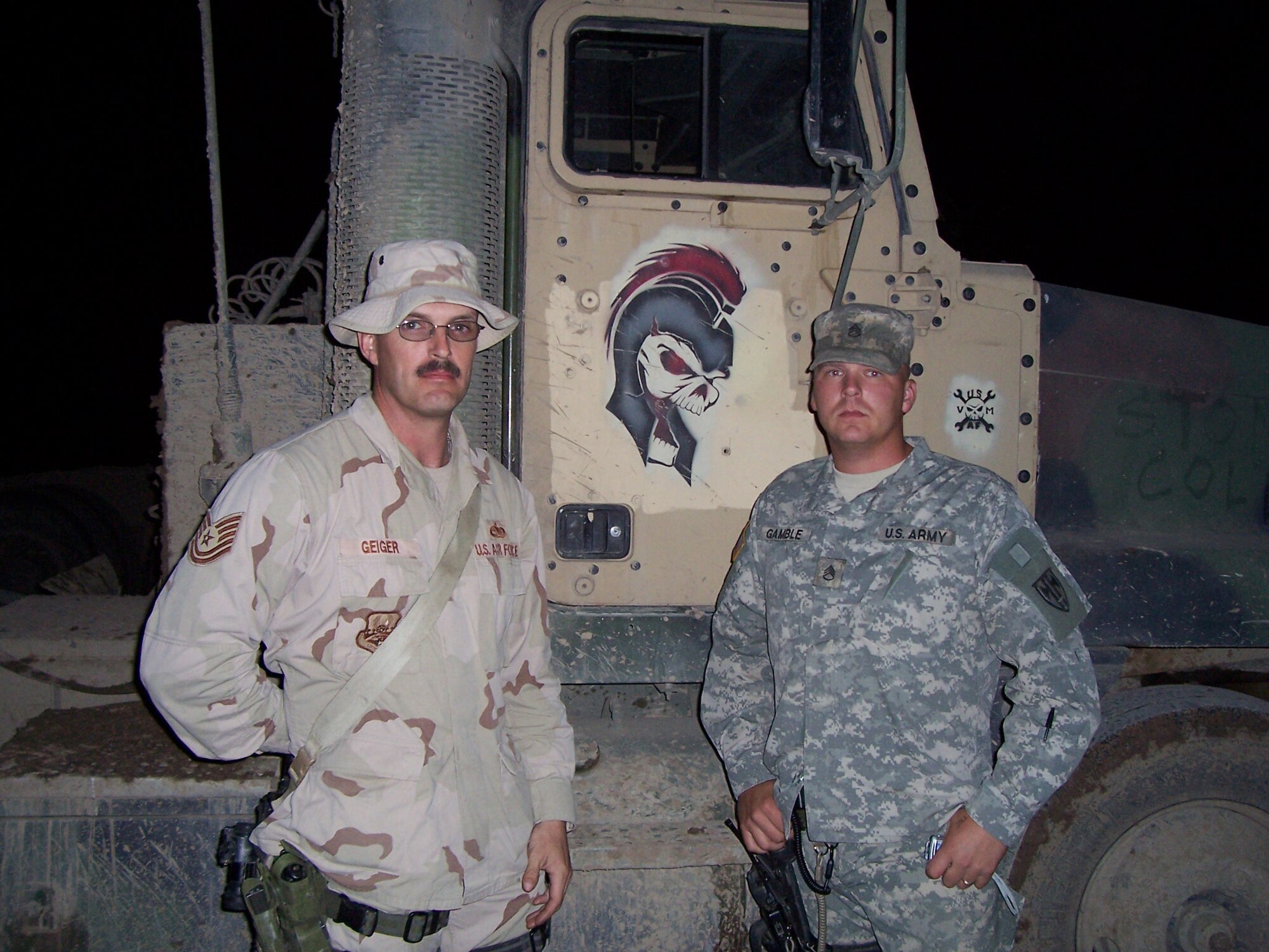 Master Sgt. William Geiger Jr., left,  and Army Sergeant 1st Class Matthew Gamble pose for a photo. Sergeant Geiger, a vehicle operations supervisor in the 78th Logistics Readiness Squadron, spent time in Iraq as a convoy commander. Courtesy photo