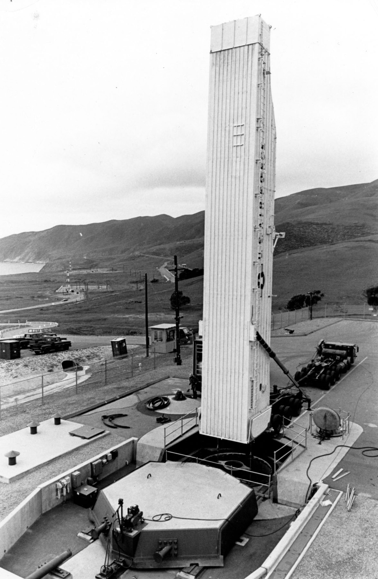 The transporter erector can hoist or lower a missile into the silo by elevating its trailer to a vertical position. This test and training silo is at Vandenberg AFB, Calif. (U.S. Air Force photo)
