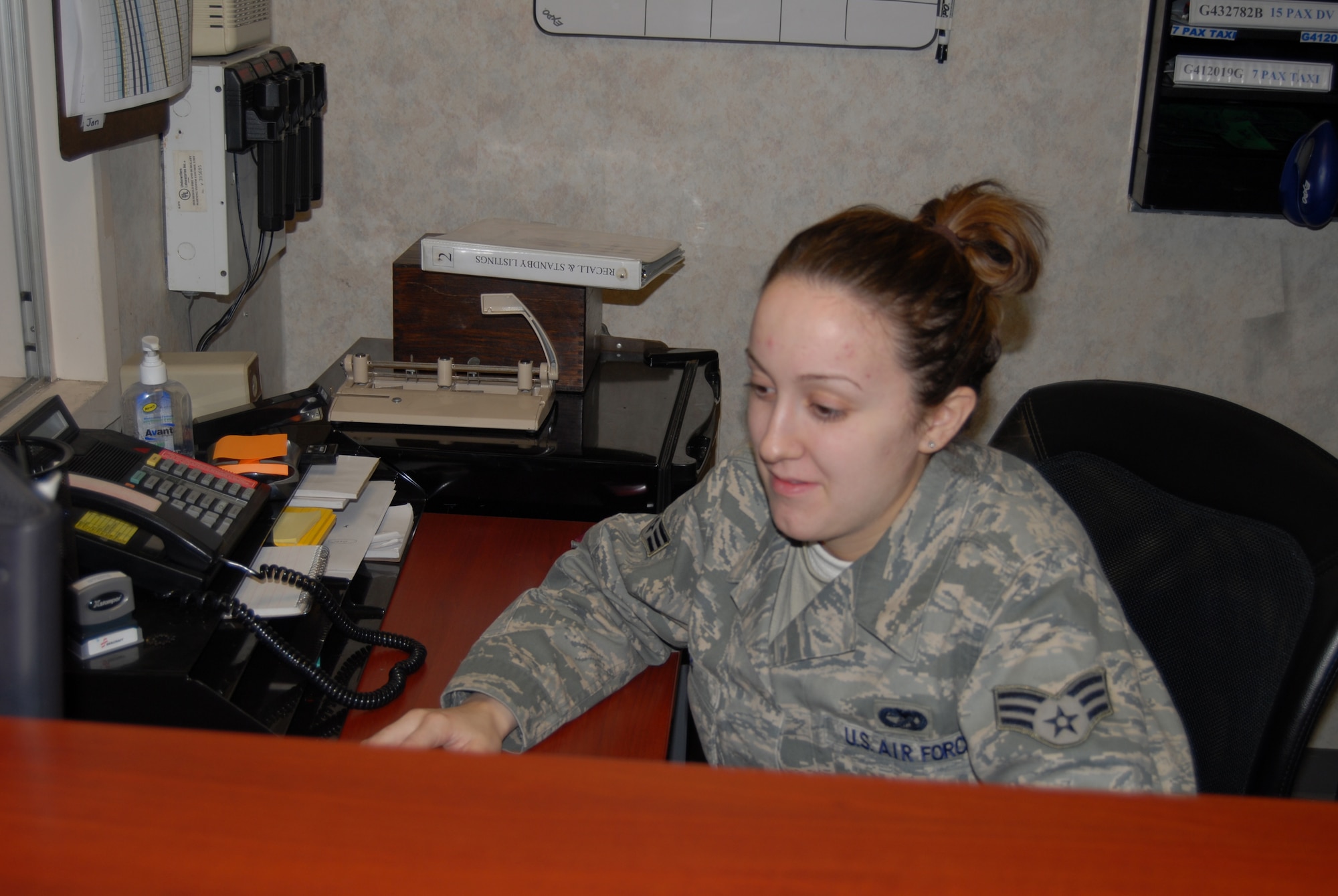 Senior Airman Brittany Goff, 43rd Logistics Readiness Squadron vehicle operations dispatcher, checks the dispatch log while working a New Years Eve/Day shift Dec. 31.
Airman Goff said she and the other personnel on shift are there in case a plane landed at Pope.
“We provide assistance to the aircrew making sure they are taken care of while they are here, especially during the holiday seasons,” said Airman Goff. “Whether it is at 9 p.m. or 2 a.m. we ensure they get everything they need.”
Airman Goff said she enjoyed working the revised holiday schedule as she was able to spend time with her family in Maryland over Christmas.
(U.S. Air Force Photo by Tech Sgt. Todd Wivell)