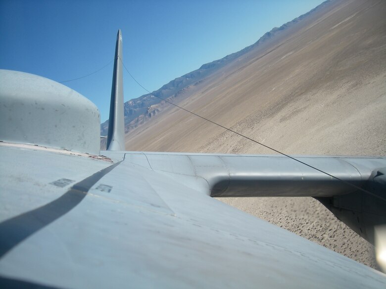 The Nevada desert is in the rear view of a 37th Airlift Squadron C-130 while it participates in the Mobility Air Forces Exercise near Nellis Air Force Base, Nov. 19, 2008. (U.S. Air Force photo by Capt. Mike Trimble)