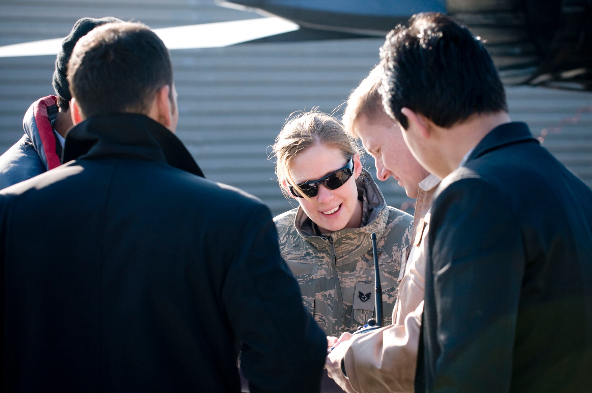 Staff Sgt. Rachel Martinez, public affairs specialist, provides guidance during an interview between Lt. Col. Derek Oaks, an A-10 Thunderbolt II pilot, and members of the Afghan media at Bagram Air Field, Afghanistan, Jan. 5. During the first Afghan Media Day hosted by the 455th Air Expeditionary Wing, public affairs made a concentrated effort to engage the local reporters and teach them about close air support. (U.S. Air Force photo by Staff Sgt. Samuel Morse)(released)