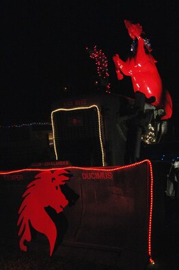 ANDERSEN AIR FORCE BASE, Guam - The 554th Red Horse Squadron displayed their unit trademark during Rota Walk Dec. 20. Every year, leadership residing throughout Rota Drive, light up the street with many colorful decorations for the holiday season. (U.S. Air Force photo by Senior Airman Sonya Croston)
