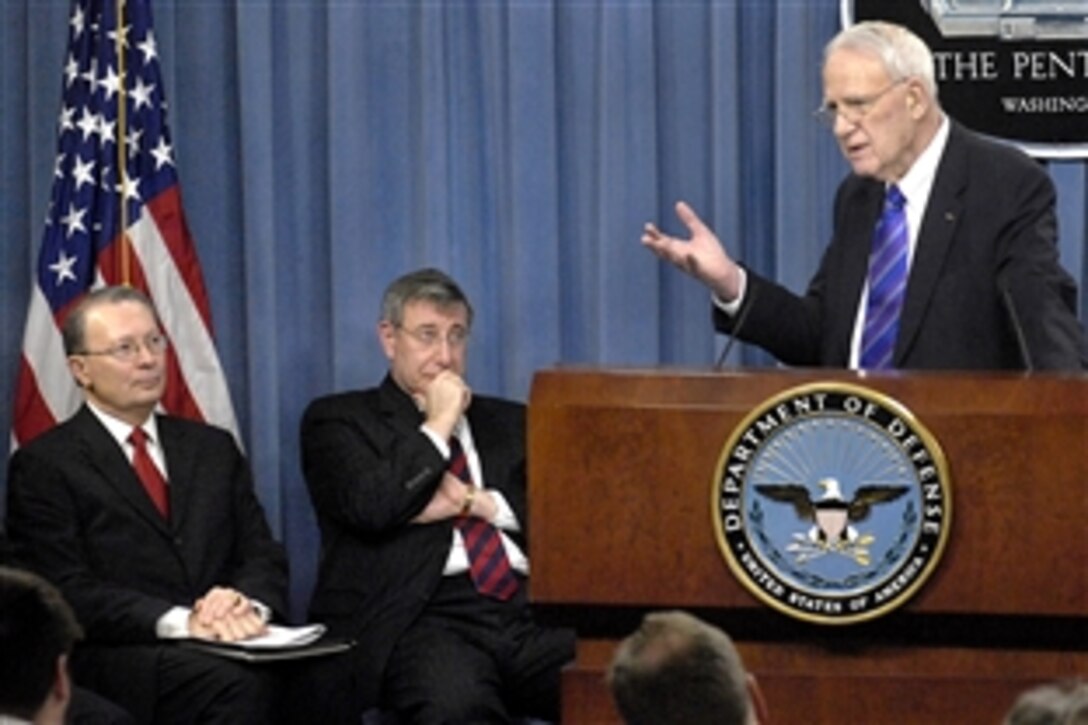 James R. Schlesinger, chairman of the Secretary of Defense Task Force on Nuclear Weapons Management, discusses his team's recommendations at a Pentagon press conference, Jan. 8, 2009. Two task force members, retired U.S. Navy Adm. Edmund Giambastiani, former vice chairman of the Joint Chiefs of Staff, left, and Frank Miller, center, President Bush's senior director for defense policy and arms control at the National Security Council, participate in the briefing.  