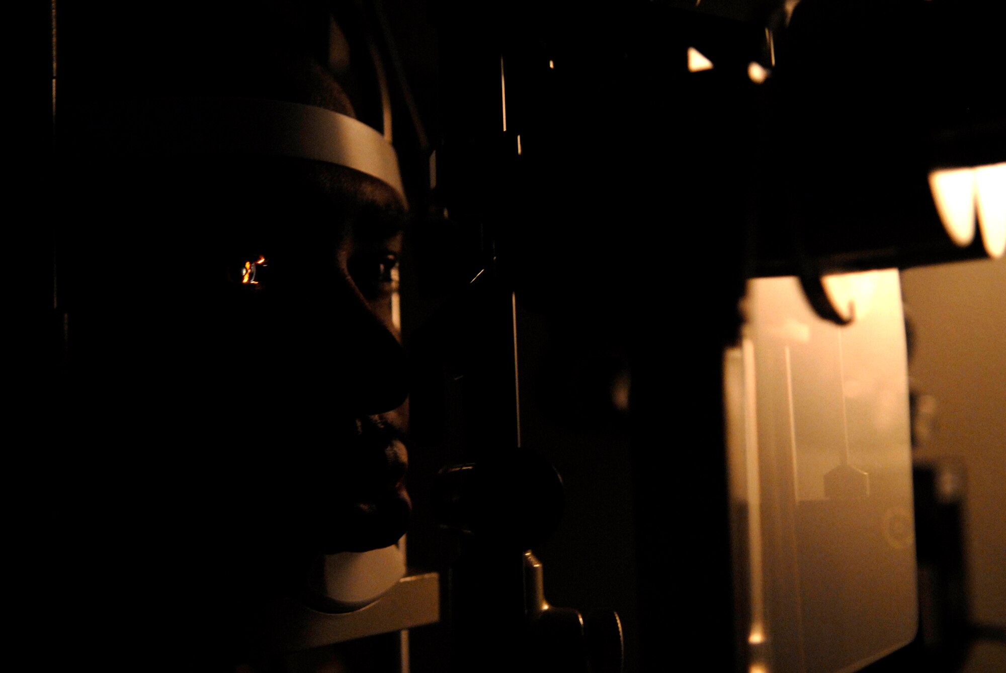 VANDENBERG AIR FORCE BASE, Calif. -- Staff Sgt. Fred McCree, an optometry craftsman with the 30th Medical Operations Squadron, gets an eye exam on Jan. 8. It is important  to get annual checks to stay fit to fight. (U.S. Air Force photo/Senior Airman Christian Thomas) 
