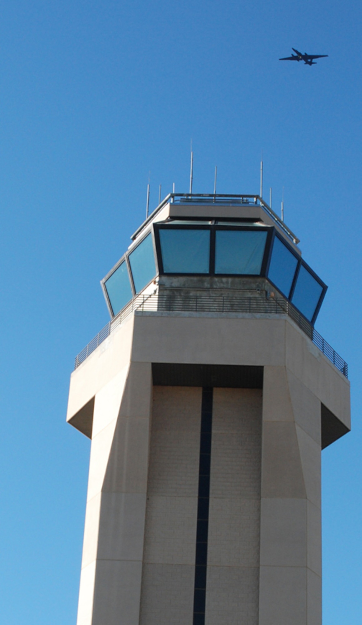 A U-2 flies by the control tower Jan. 9 as part of a routine sortie. Beale's control tower houses the air traffic controllers who communicate with U-2 and T-38 pilots. (Photo by Airman 1st Class Chuck Broadway)