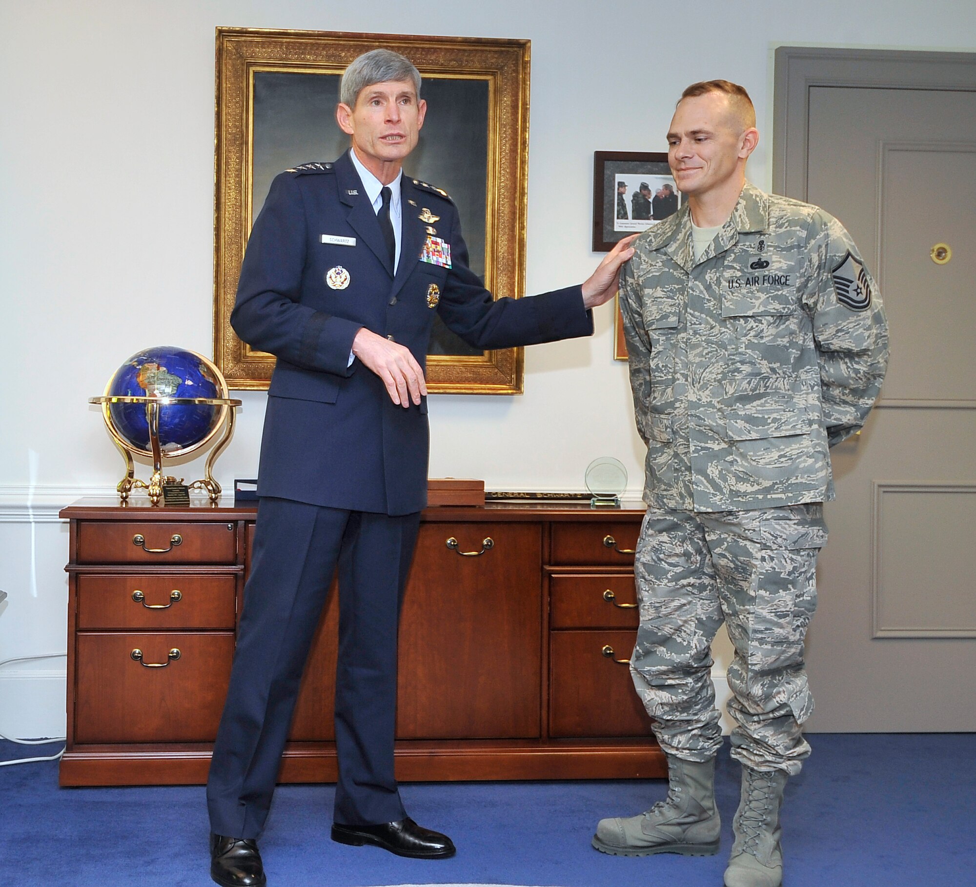 Air Force Chief of Staff Gen. Norton Schwartz talks about Master Sgt. David Webber during his presentation of the Purple Heart medal to Sergeant Webber Jan. 8 in the Pentagon.  (U.S. Air Force photo/Scott M. Ash)
