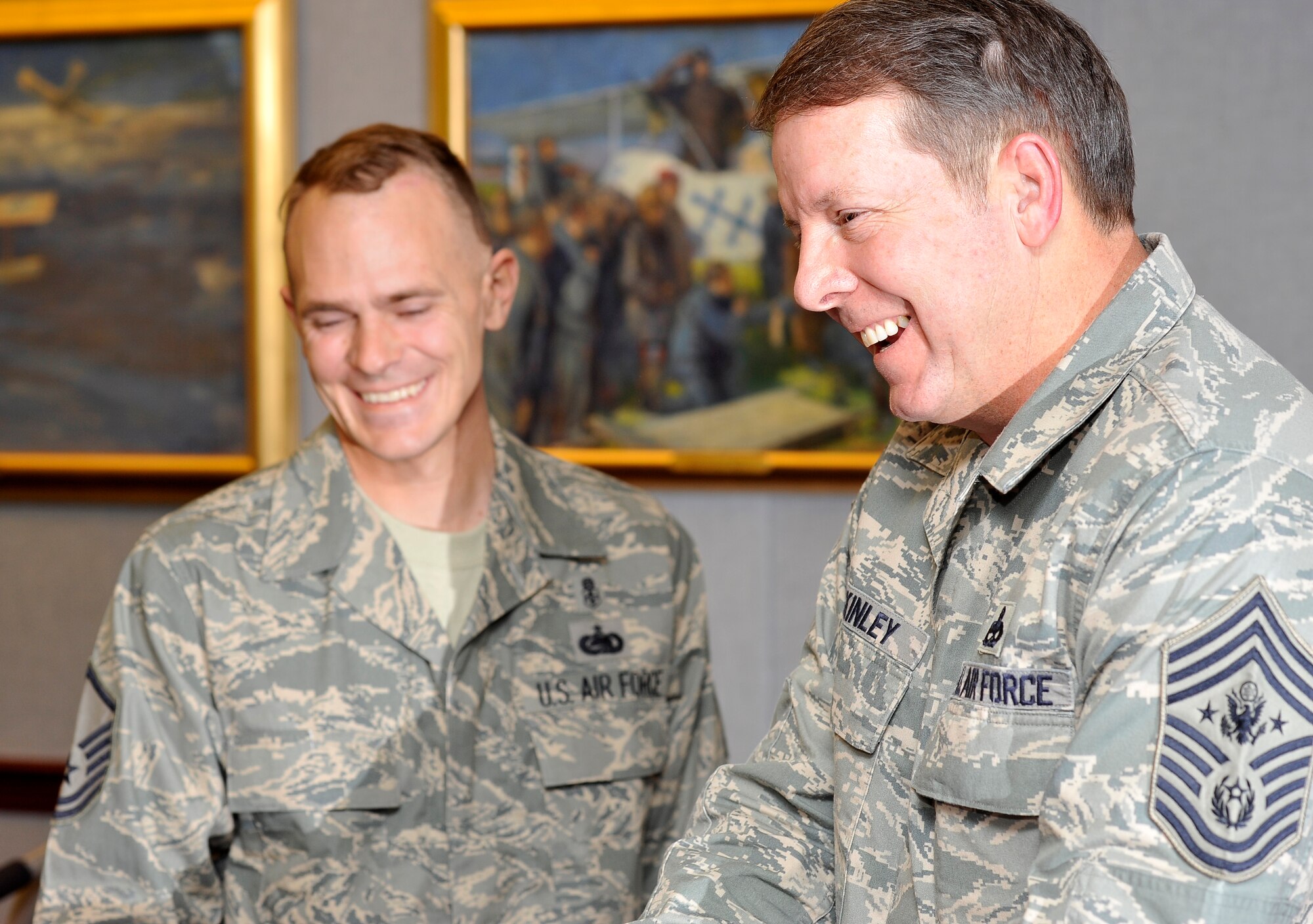 Master Sgt. David Webber chats with Chief Master Sgt. of the Air Force Rodney McKinley Jan. 8 in the Pentagon prior to Sergeant Webber receiving the Purple Heart. The medal was presented by Air Force Chief of Staff Gen. Norton Schwartz.  (U.S. Air Force photo/Scott M. Ash)