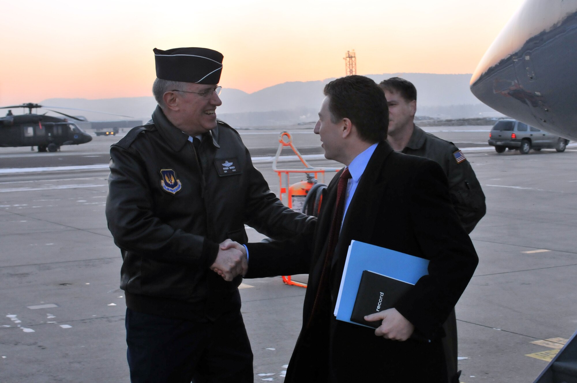 Gen. Roger Brady, USAFE commander, greets Ambassador Kurt Volker, U.S. Permanent Representative to NATO, upon his arrival today at Ramstein Air Base, Germany. During the visit General Brady and Ambassador Volker discussed USAFE’s roles and mission in Europe, to include USAFE’s participation in Baltic Air Policing and the newly formed Heavy Airlift Wing at Papa, Hungary. In addition to briefings and a visit with CC-Air NATO, Ambassador Volker also witnessed first-hand how patients arriving from Iraq and Afghanistan are moved from Germany to the United States on aeromedical evacuation flights. (U.S. Air Force photo by Senior Airman Nathan Lipscomb)