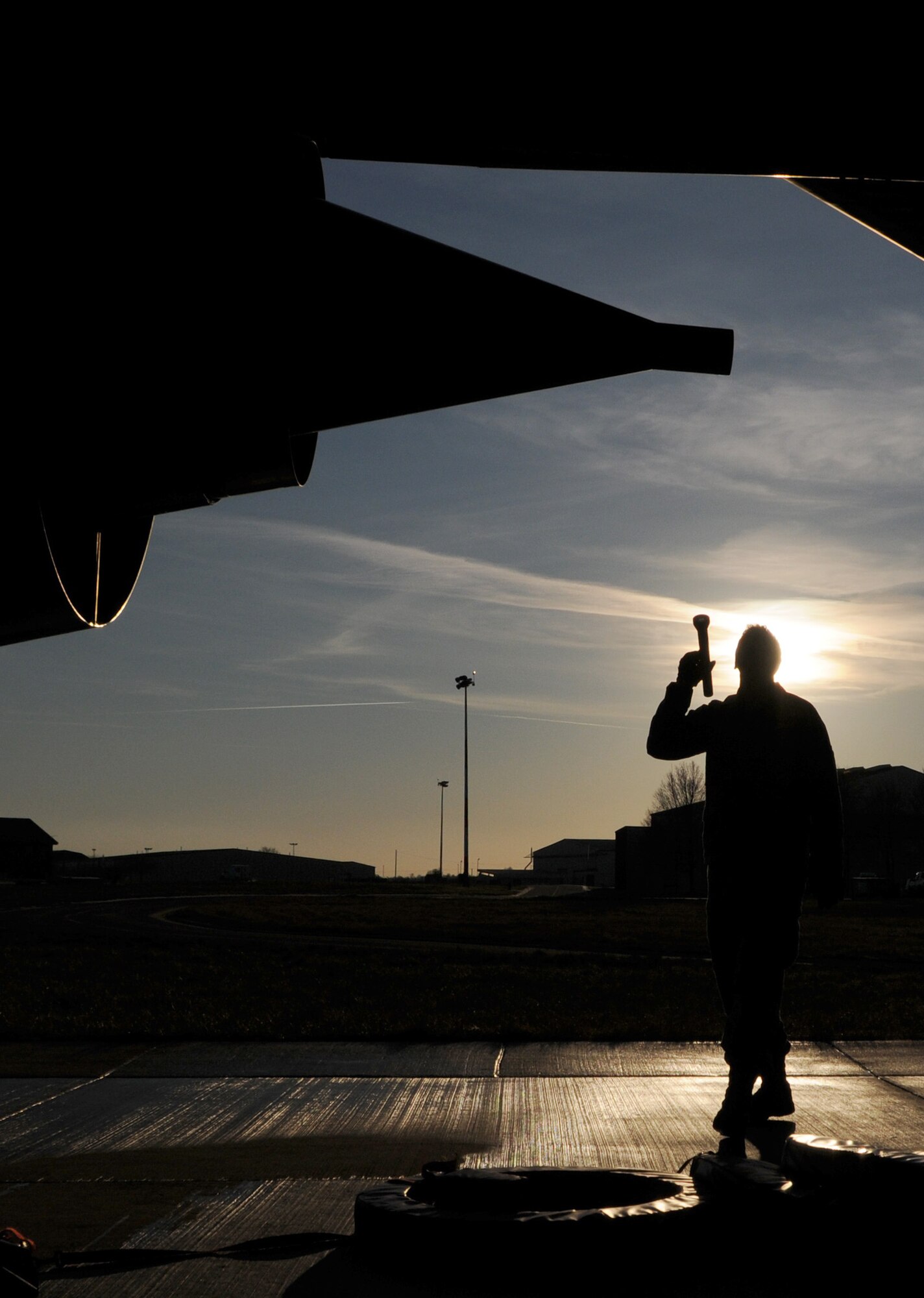 Airman 1st Class Brandon Ansbro, a crew chief from the 100th Aircraft Maintenance Squadron, performs a “Thru Flight Inspection” on the aft section of the number 4 engine of a KC-135 Jan. 6, 2009, at RAF Mildenhall, England. The purpose of Airman Ansbro’s inspection is to verify the security and integrity of the entire aircraft after flight operations. (U.S. Air Force photo by Staff Sgt. Jerry Fleshman)