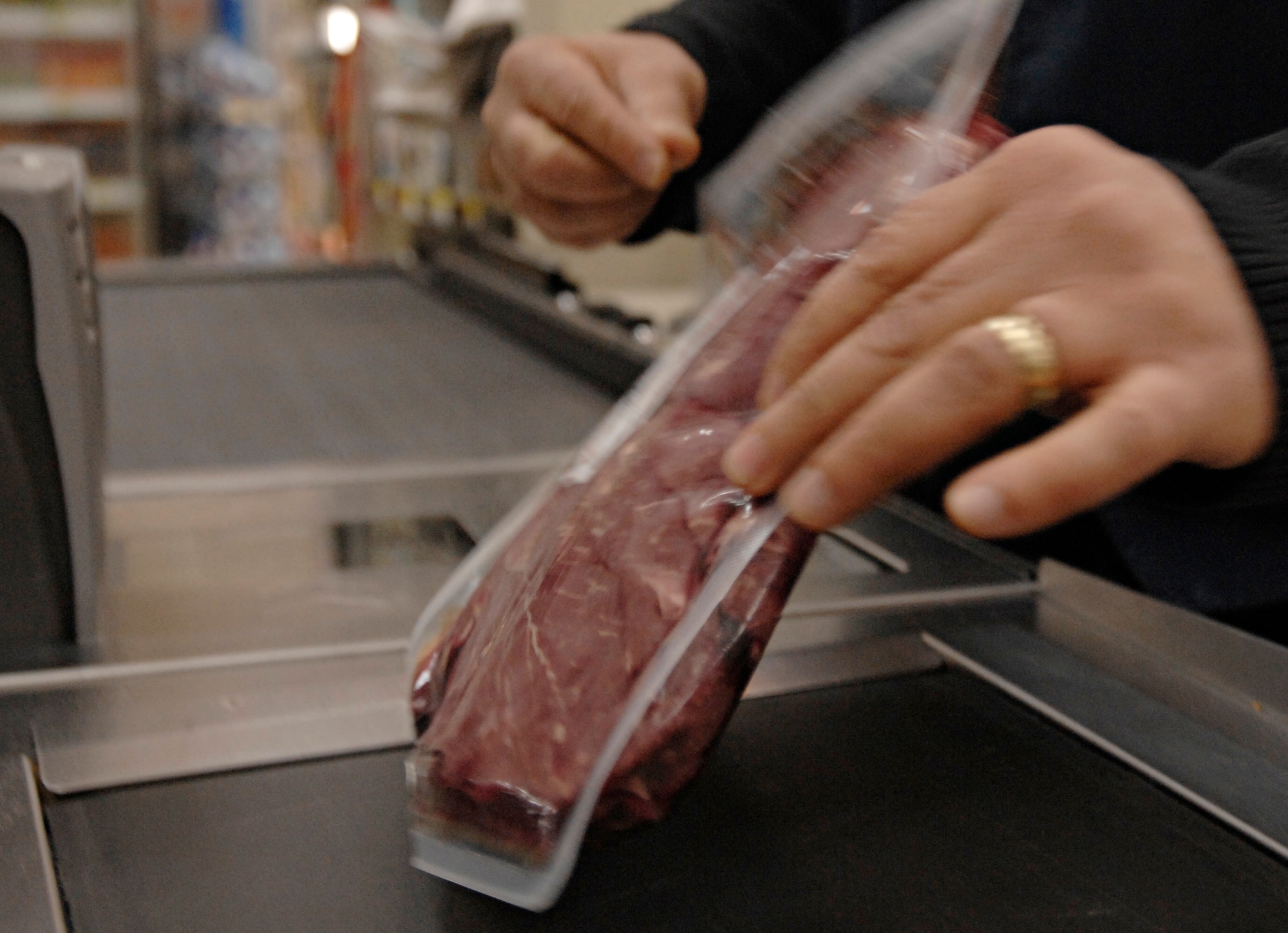 Mehmet Ozkaya, commissary register clerk, scans a package of beef, Jan. 7. Most fresh produce provided by Incirlik’s commissary is ordered from warehouses in Germany and inspected before being placed on the shelf, Jan. 7. (U.S. Air Force photo/Senior Airman Benjamin Wilson)