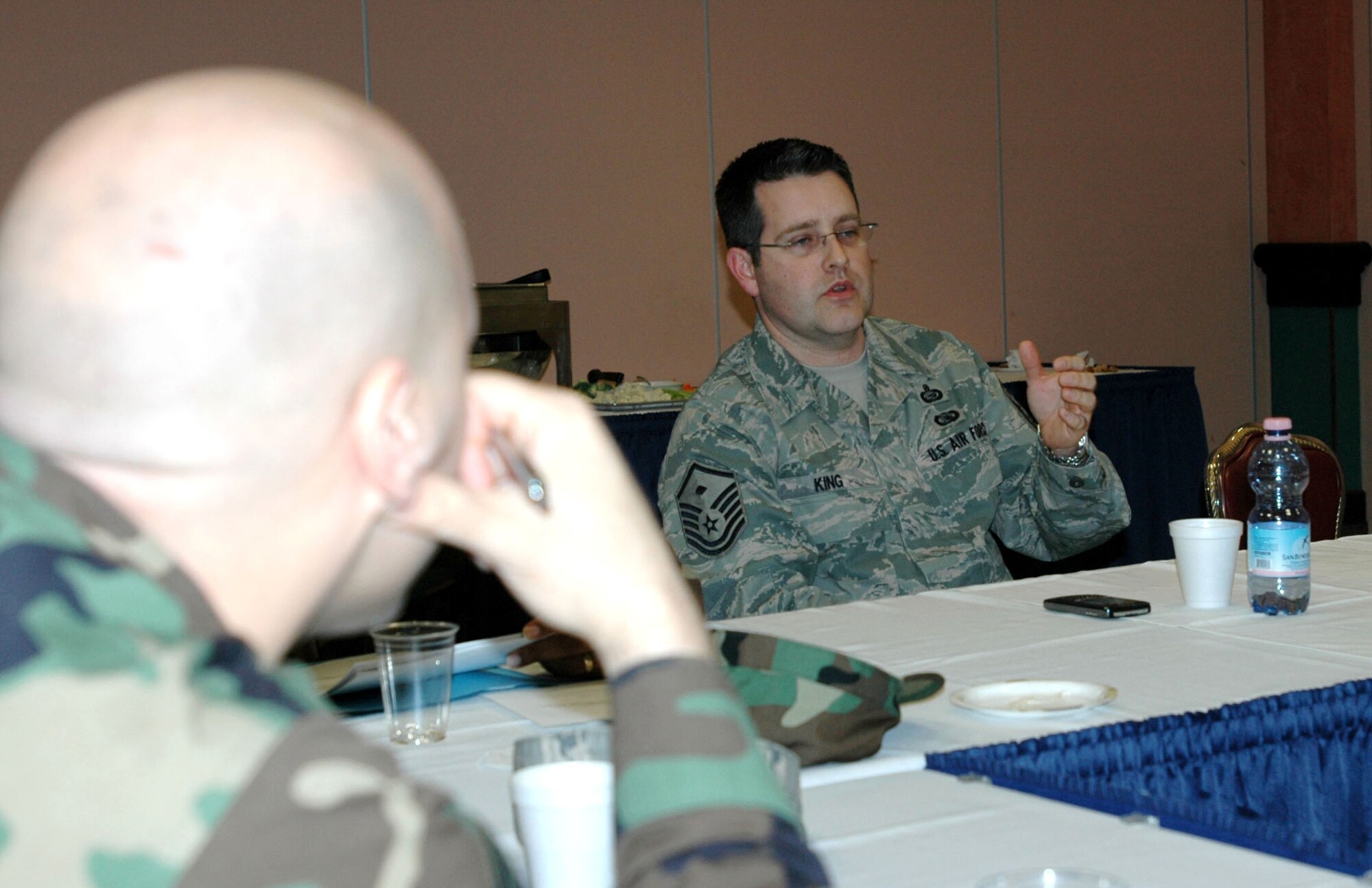 Master Sgt. Christopher King, 31st Communications Squadron first sergeant, answers questions and gives advice to members of the Aviano 5/6 Jan. 9, 2009. The Air Force is in need of dedicated and motivated master sergeants to fill the special duty of first sergeant. (U.S. Air Force photo/Tech. Sgt. Charlein Sheets)