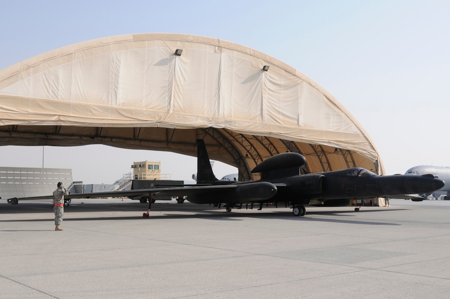 SOUTHWEST ASIA -- Major Thomas Ryan, 99th Expeditionary Reconnaissance Squadron, mission pilot, receives his final salute as he taxies out prior to his 2000 hour flight at the helm of a U-2 Dragon Lady, Jan. 9. Maj. Ryan is the 25th pilot to reach the 2000 hour milestone. Maj. Ryan is deployed to the 380th Air Expeditionary Wing from the 9th Reconnaissance Squadron, Beale AFB, Calif. and hails from Sneads Ferry, N.C. Calif. (U.S. Air Force photo by Senior Airman Brian J. Ellis)(Released)