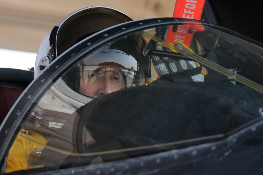 SOUTHWEST ASIA -- Major Thomas Ryan, 99th Expeditionary Reconnaissance Squadron, mission pilot, adjusts in the cockpit before take-off on his 2000 hour flight at the helm of a U-2 Dragon Lady, Jan. 9. Maj. Ryan is the 25th pilot to reach the 2000 hour milestone. Maj. Ryan is deployed to the 380th Air Expeditionary Wing from the 9th Reconnaissance Squadron, Beale AFB, Calif. and hails from Sneads Ferry, N.C. Calif. (U.S. Air Force photo by Senior Airman Brian J. Ellis)(Released) 
