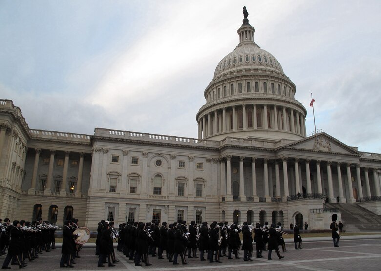 The U.S. Army Band, also known as Pershing's Own, marches in front of the Capitol Jan. 11 during the 56th Presidential Inaugural Rehearsal. ::r::::n::