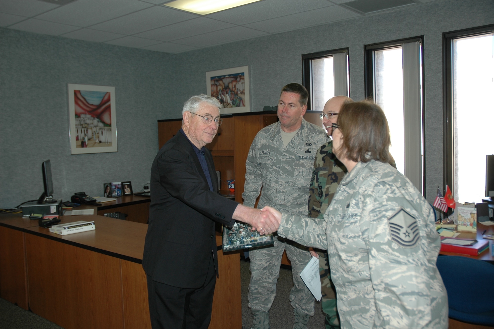 Chief Master Sgt. (ret) Robert Gaylor, 5th Chief Master Sergeant of the Air Force, greets members of the 944th Fighter Wing during his visit to Luke Air Force Base, Ariz., Jan. 9 and 10. Chief Gaylor was the keynote speaker during the 944th FW annual Senior NCO and NCO Induction Ceremony. (U.S. Air Force photo/Staff Sgt. Stephen Razo)