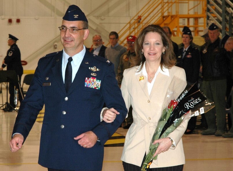 Col. James J. Muscatell, Jr. heads to the 403rd Wing, Keesler Air Force Base, Miss,. with his wife Nancy following a change of command ceremony Jan. 10 at Peterson AFB, Colo. (U.S. Air Force photo/Tech. Sgt. Daniel Butterfield)