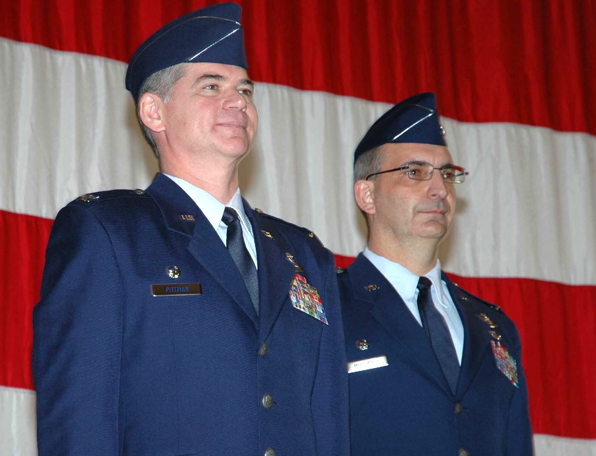 Col. Jack H. Pittman, Jr. (left) assumed command of the 302nd Airlift Wing during a Jan. 10  change of command ceremony at Peterson Air Force Base, Colo. Col. James J. Muscatell, Jr. went on to take command of the 403rd Wing, Keesler AFB, Miss. (U.S. Air Force photo/Tech. Sgt. Daniel Butterfield)