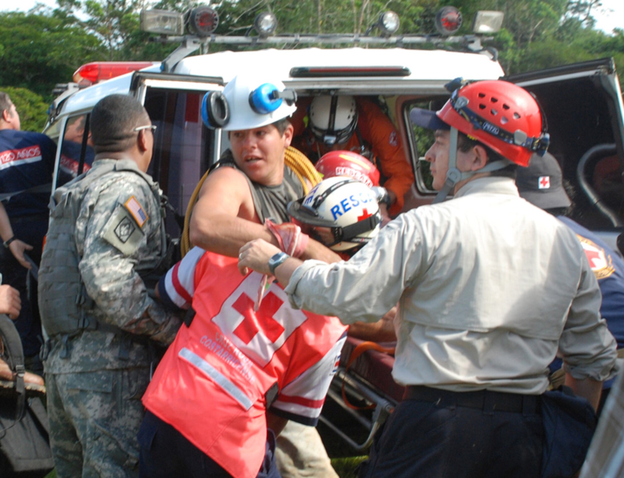 SAN MIGUEL, COSTA RICA—Members of the Costa Rican Red Cross load an earthquake victim with a broken leg into an ambulance here Saturday. The man was rescued by Joint Task Force-Bravo personnel via Blackhawk helicopter. Four JTF-Bravo helicopters and 34 servicemembers are deployed here from Soto Cano Air Base, Honduras, at the request of the Costa Rican government in order to provide life-saving support to those affected by the earthquake.  (U.S. Air Force photo/1st Lt. Candace Park)