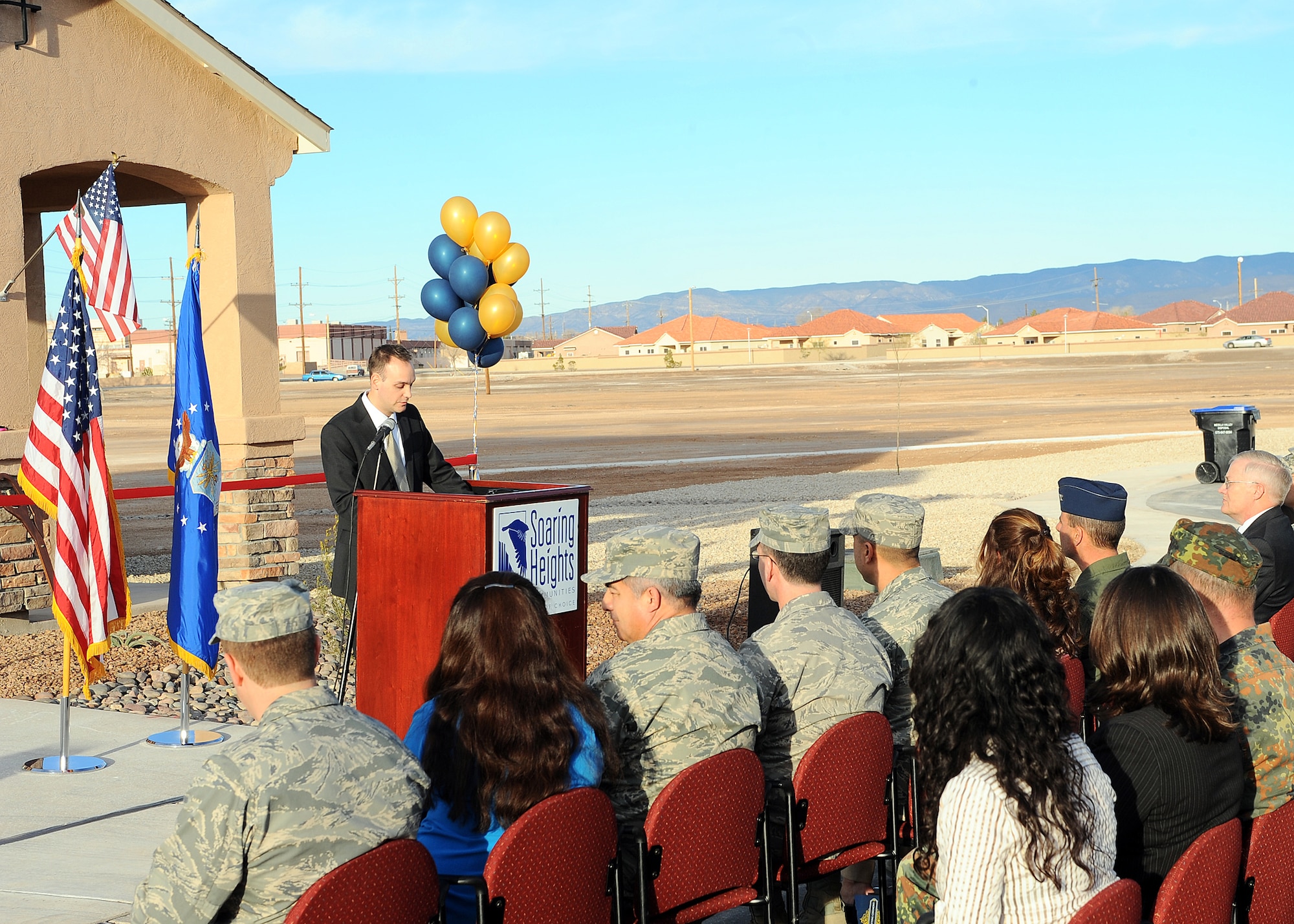 Ryan Kleinau, Soaring Heights Communities project director, speaks at the Soaring Heights ribbon cutting ceremony at Holloman Air Force Base, N.M., Jan.8. Mr. Kleinau played a major role in the new housing development project.