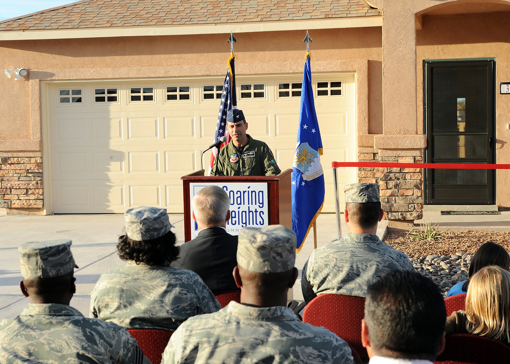 Col. Jeff Harrigian, 49th Fighter Wing commander, speaks at the Soaring Heights Communities ribbon cutting ceremony at Holloman Air Force Base, N.M., Jan. 8. The ceremony was to commemorate the first house opening on the new White Sands Drive.
