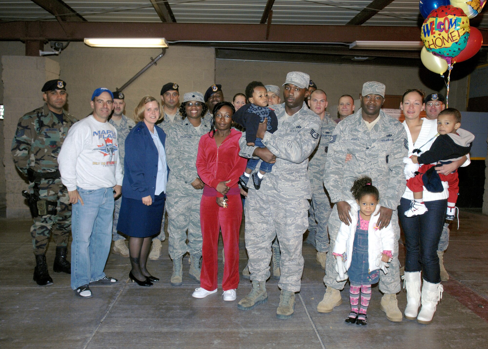 Col. Jeff Harrigian, 49th Fighter Wing commander and other senior leadership from around Team Holloman welcome back members from the 49th Security Forces Squadron after serving a six month deployment to Southwest Asia, Jan. 5,  at Holloman Air Force Base, N.M. (U.S. Air Force photo/Senior Airman Anthony Nelson)
