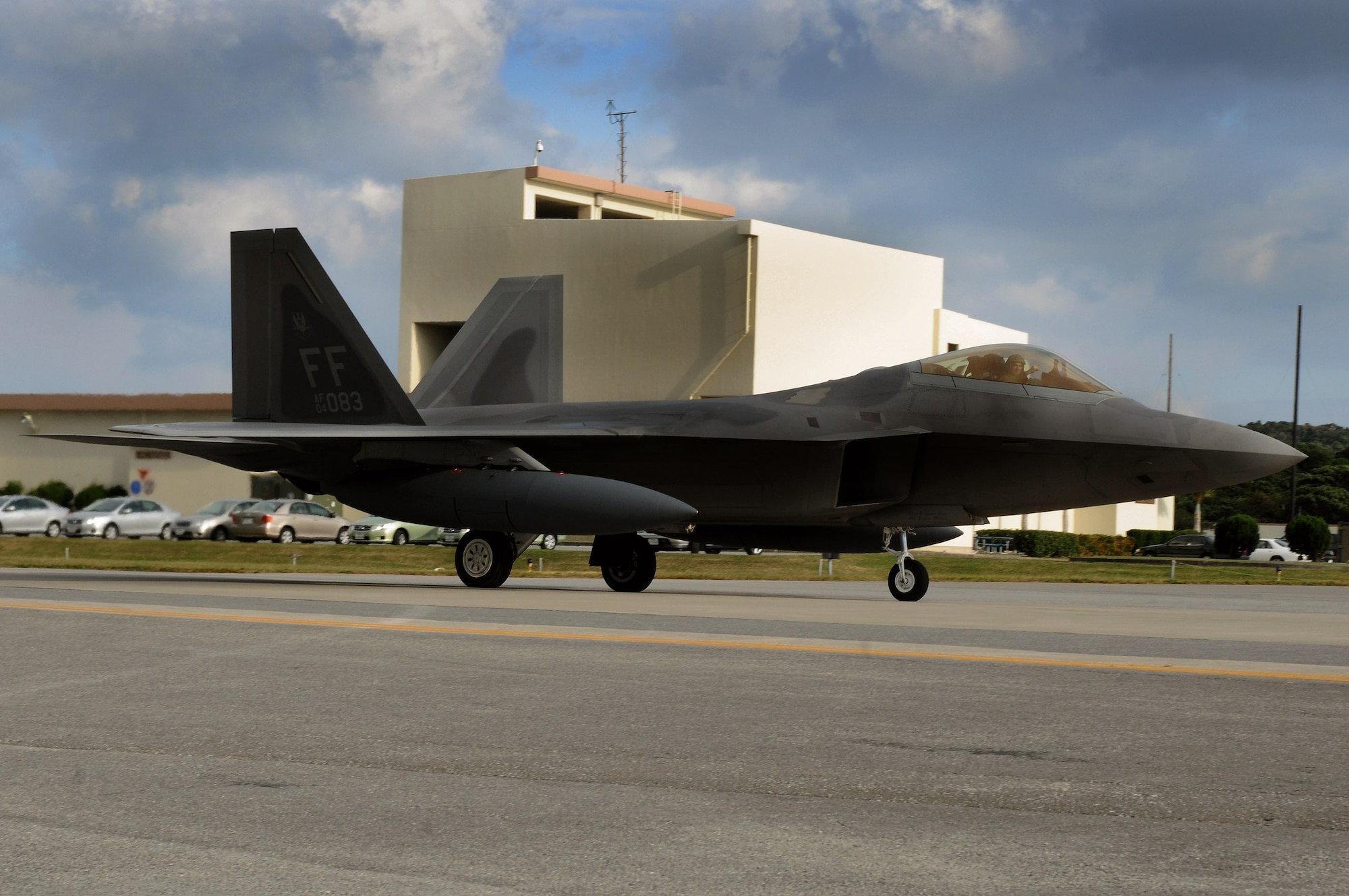 After landing at Kadena Air Base, Japan, an F-22 Raptor taxis down the runway Jan. 11. The aircraft is one of 12 deployed from Langley Air Force Base, Va., as part of an air expeditionary force rotation. (U.S. Air Force photo/Airman 1st Class Amanda Grabiec)
