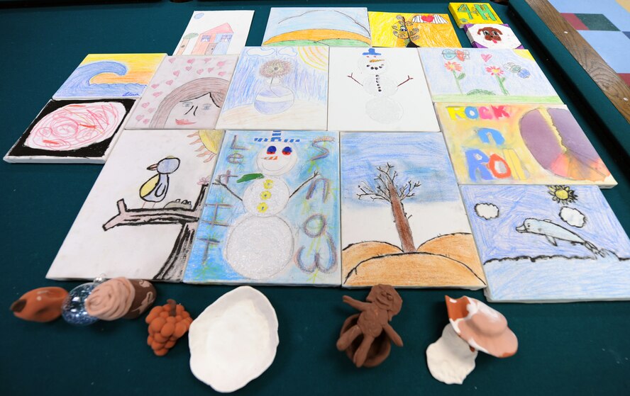 MOODY AIR FORCE BASE, Ga. -- Artwork created by children who attend the Youth Center is displayed here Jan 9. The Youth Center will be holding its annual National Fine Arts Exhibit Jan.15 here from 5 to 7 p.m. This year the program encourages artistic expression among club members who range in age from 6 to 18 years through drawing, painting, printmaking, collage, mixed media and sculpture. (U.S. Air Force photo by Airman Joshua Green)
