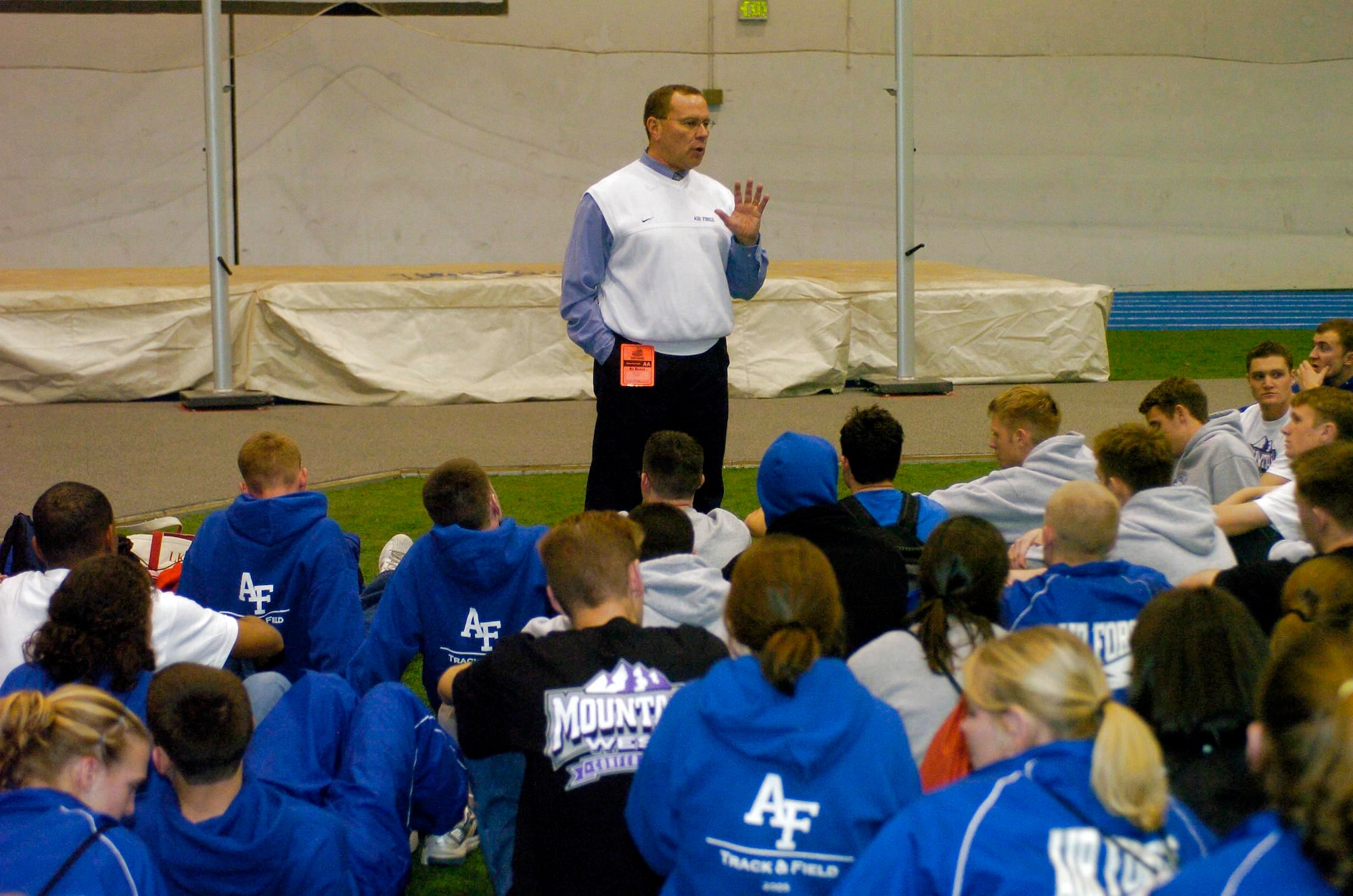 Air Force Academy track and field head coach Ralph Lindeman addresses the team during a track meet.  Mr. Lindeman was inducted into the Arizona Track and Cross Country Coaches Hall of Fame Jan. 9 in Glendale, Ariz.  (Courtesy photo/Steve Walters)
