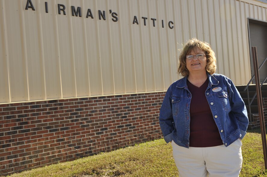MOODY AIR FORCE BASE, Ga. -- Cindy Bonner, manager of the Airman’s Attic, stands in front of the building here Jan. 8. The Airman's Attic offers enlisted Airmen who hold the rank of E-5 and below, previously-owned household items for free. The attic's hours of operation are from 10 a.m. to 2 p.m. Tuesday through Thursday. (U.S. Air Force photo by Senior Airman Schelli Jones)