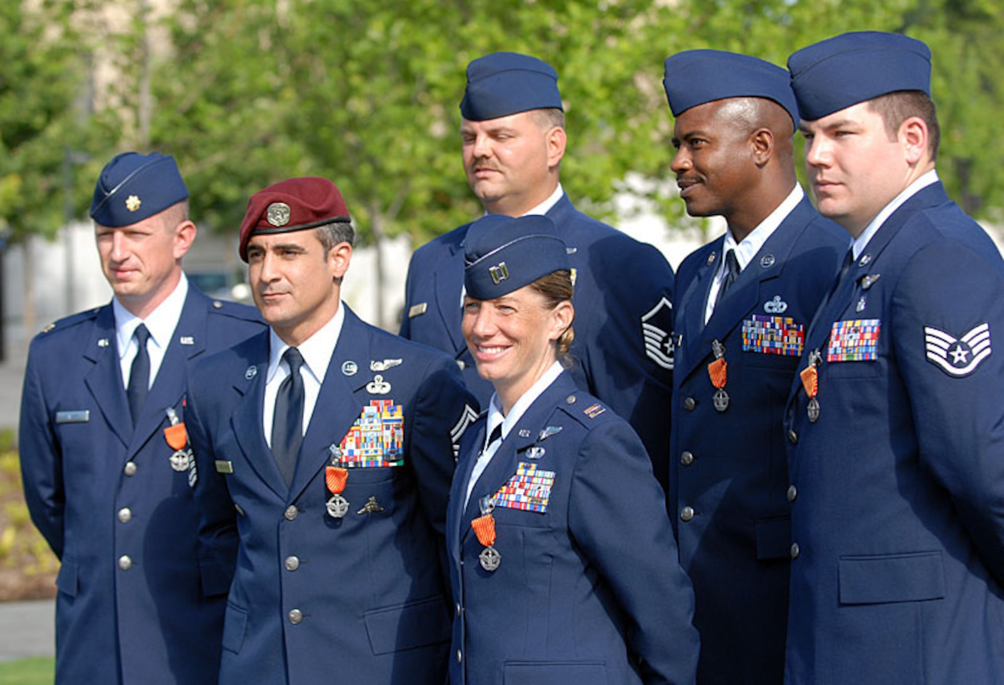 The first Combat Action Medals were awarded to six Airmen on June 12, 2007. (Front row, left to right): Maj. Steven Raspet, Senior Master Sgt. Ramon Colon-Lopez, Capt. Allison Black. Back row, left to right: Master Sgt. Byron Allen, Master Sgt. Charlie Peterson, Staff Sgt. Daniel Paxton. (U.S. Air Force photo)