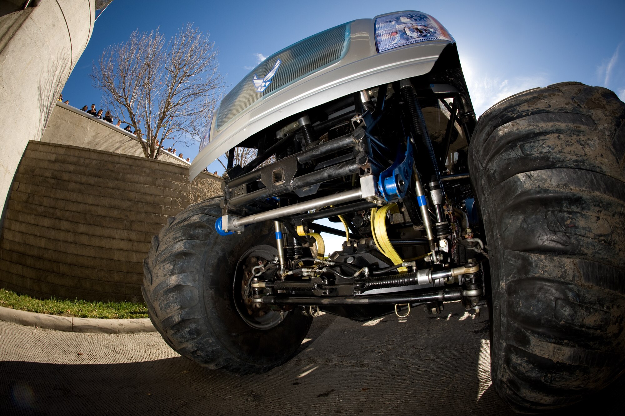 2009 Monster Jam fans got an eyeful at the Alamodome Jan. 11 in San Antonio when Air Force Afterburner and 15 other monster trucks made their entrance into the arena. Approximately 45,000 people attended the event.  Afterburner has a 540 cubic-inch Merlin supercharged racing V-8 engine that churns out 1,425 horsepower for its driver, Damon  Bradshaw.  The 10,000-lb vehicle is equipped with four-wheel steering and can be made to continuously spin on a dime.  The massive tires are 66" tall and together with the wheels weigh 750 lbs. (U.S. Air Force photo/Lance Cheung)