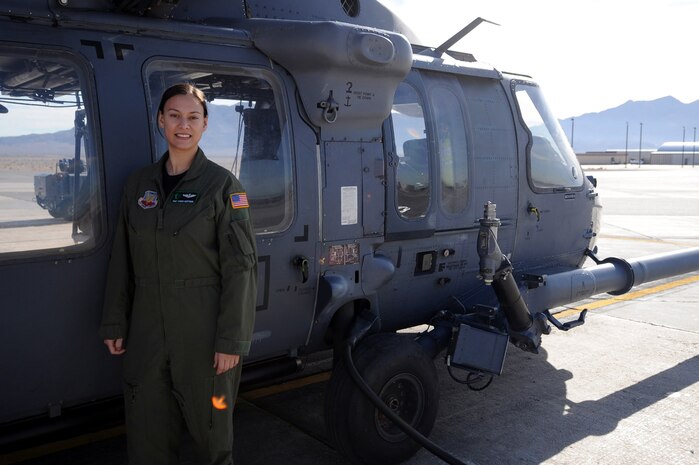Staff Sgt. Zarah Hartsock, 66th Rescue Squadron combat rescue flight engineer received notification of her STEP promotion to the rank of Technical Sergeant Dec. 23. She posed for a photo with the HH-60 Pave Hawk here Jan. 6. (U.S. Air Force Photo/Senior Airman Jason R. Huddleston) 