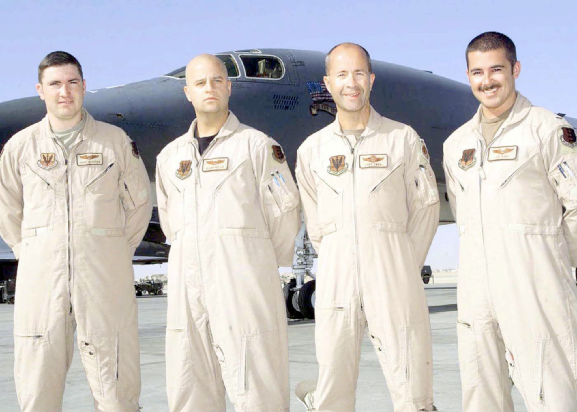 On April 7, 2003, a B-1B Lancer crew from the 28th Bomb Wing quickly found and destroyed a newly-identified high-value target. Pictured are the crew (left to right): Capt. Chris Wachter, Capt. Sloan Hollis, Lt. Col. Fred Swan and 1st Lt. Joe Runci. (U.S. Air Force photo)