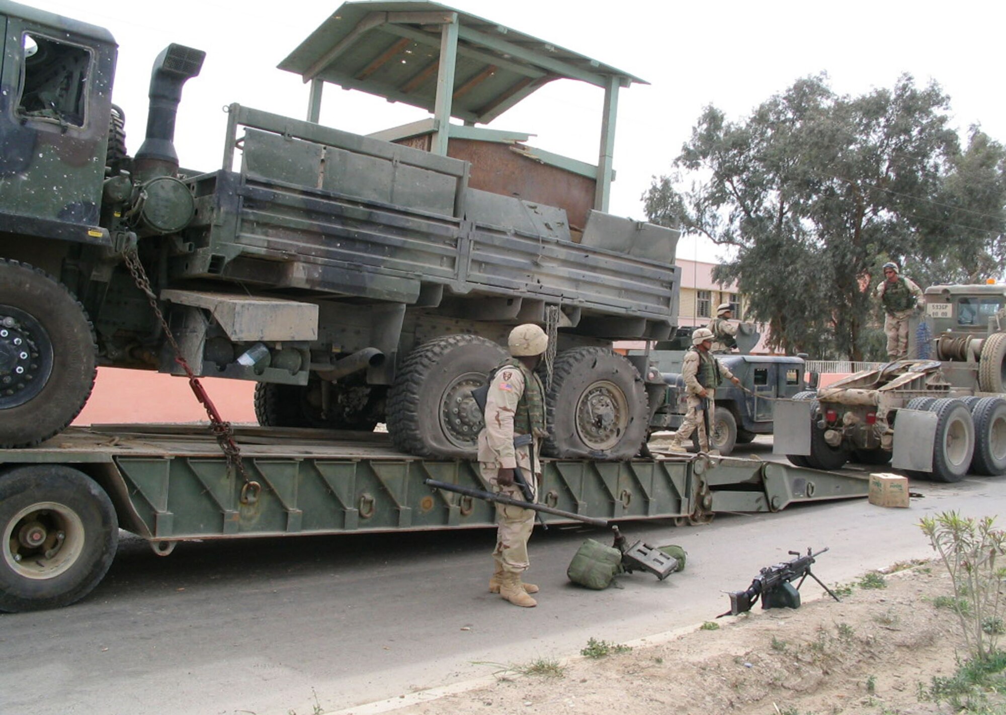 Though an IED damaged this gun truck, the fragments did not penetrate the armored gun position on the bed. (U.S. Air Force photo)