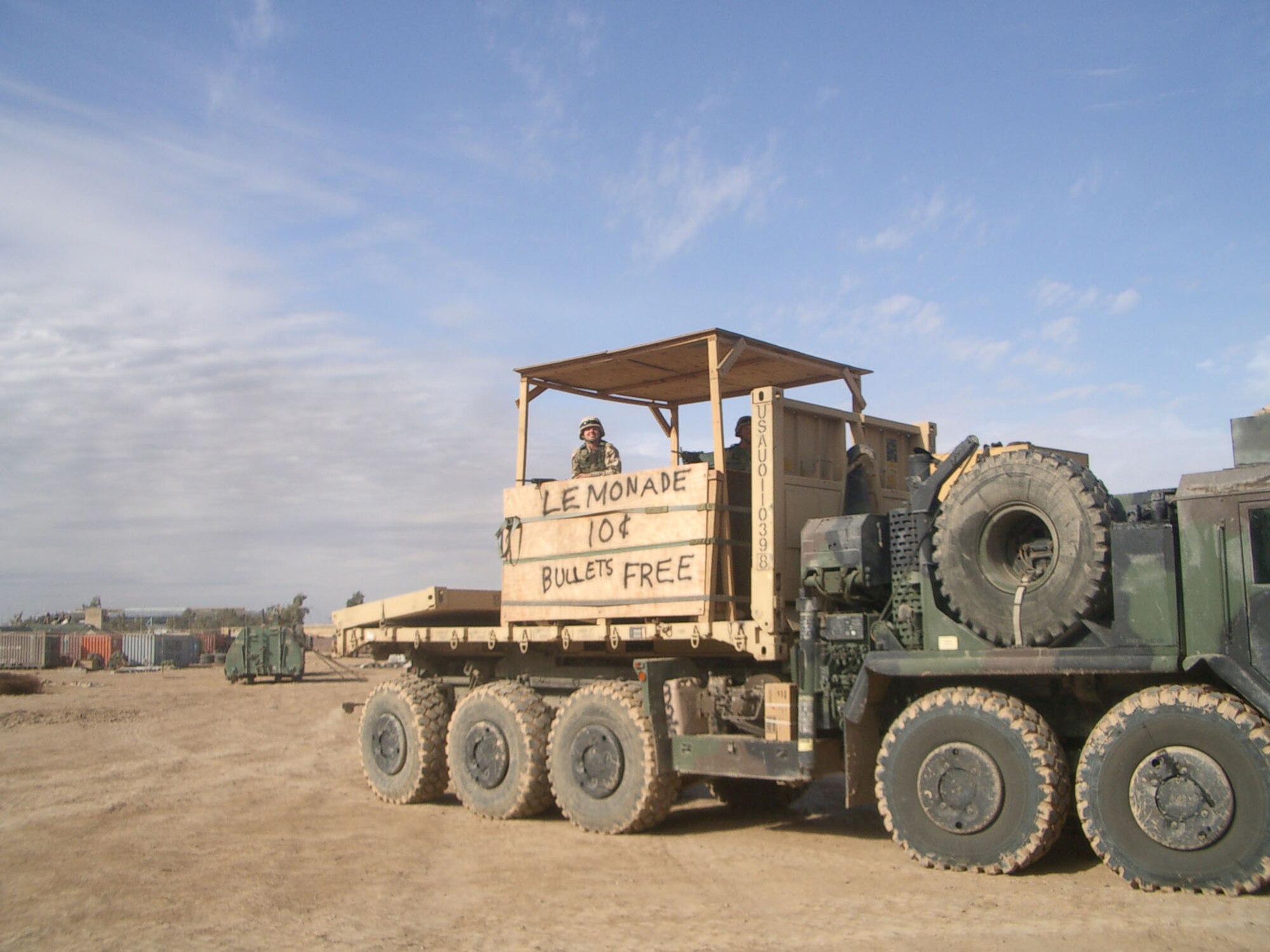 USAF convoy escort commonly used a locally-made armored box that could be put on top of a flatbed like this one here.  The crew has added a bit of humor to theirs. (U.S. Air Force photo)