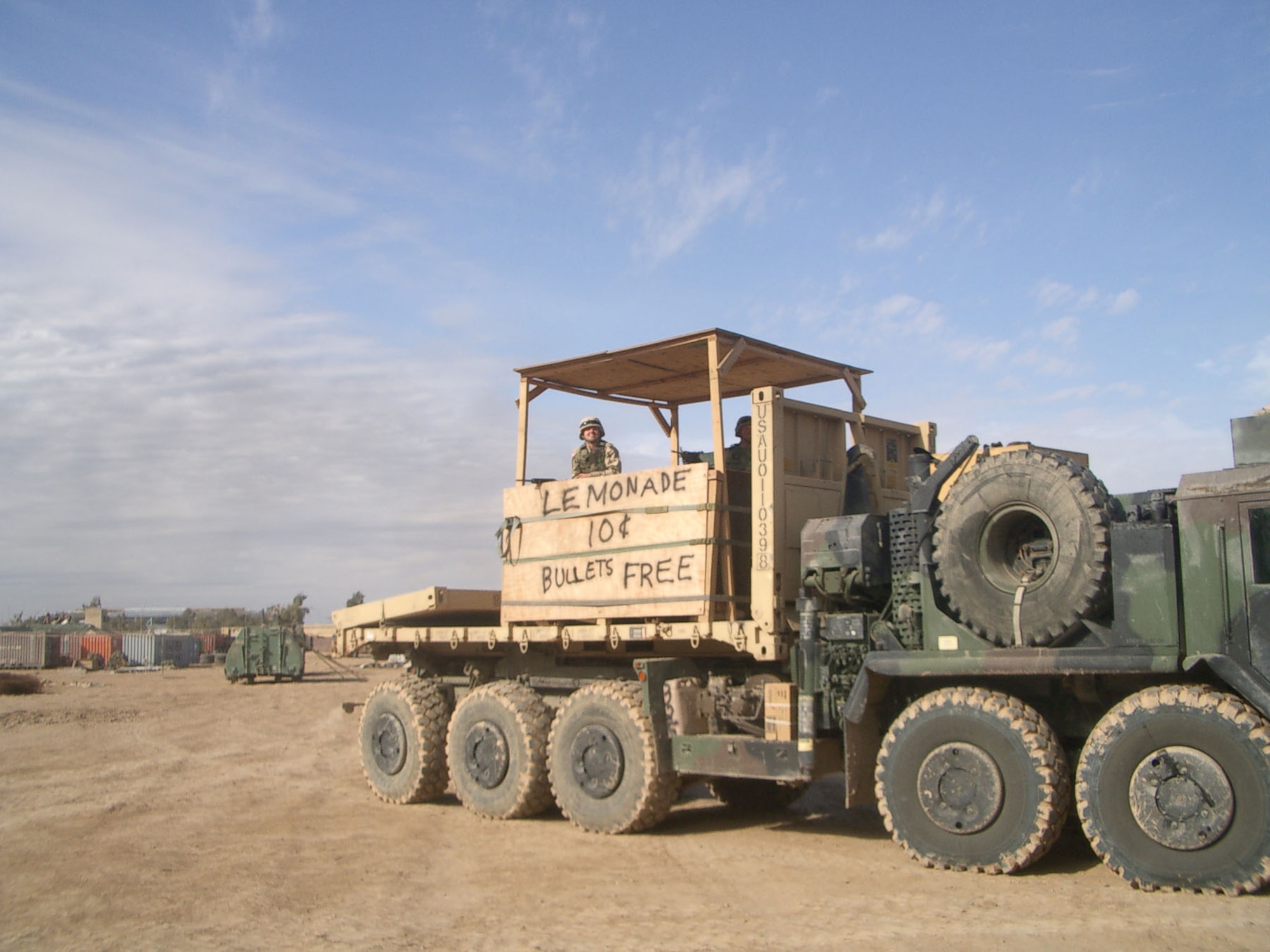 USAF convoy escort commonly used a locally-made armored box that could be put on top of a flatbed like this one here.  The crew has added a bit of humor to theirs. (U.S. Air Force photo)