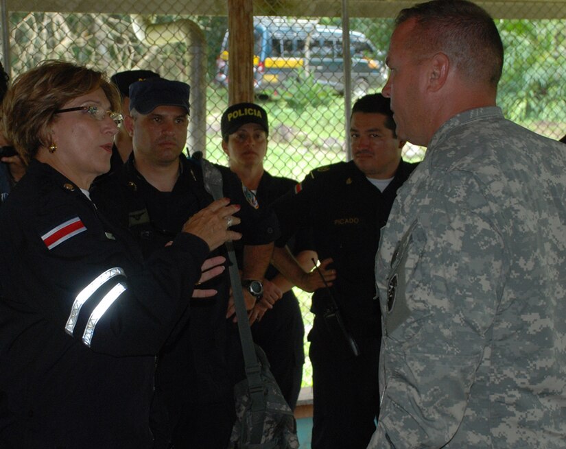 SAN MIGUEL, COSTA RICA--Marcela Chacon, vice minister of public security for Costa Rica, thanks Army Lt. Col. Richard Somers, task force commander deployed here, for Joint Task Force-Bravo’s assistance in the disaster response operation. Four helicopters and 34 servicemembers from JTF-Bravo are deployed here at the request of the Costa Rican government to provide humanitarian assistance. (U.S. Air Force photo/1st Lt. Candace Park)