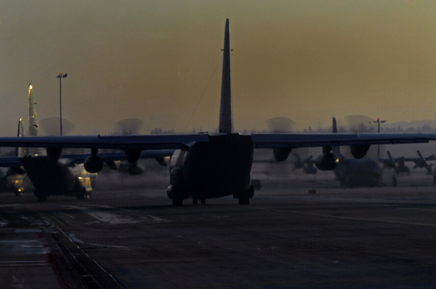C-130's stack-up in a holding pattern at Ramstein Air Base before take-off Jan. 9, 2009. The C-130's later took off and performed tactical training maneuvers in a four-ship formation. (U.S. Air Force photo by Airman 1st Class Kenny Holston)