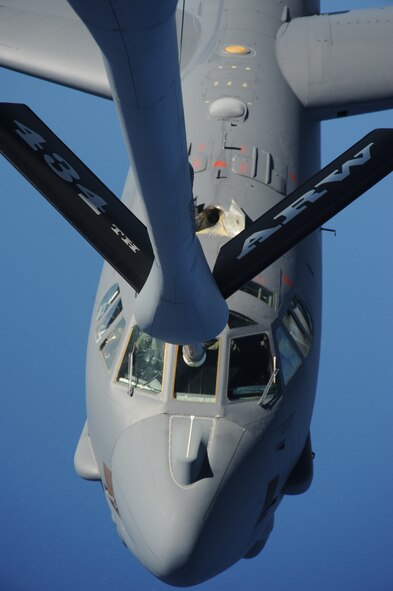 A B-52 Stratofortress from Minot Air Force Base, N.D. moves into a pre-contact position to receive fuel Jan. 9 from a KC-135 Stratotanker over the Pacific Ocean during an exercise. The B-52 is deployed to Andersen Air Force Base Guam, 23rd Expeditionary Bomb Squadron. The bomber rotation to Andersen provides the U.S. Pacific commander a continuous presence to deter and dissuade any potential aggressor in the region. The rotation to Andersen is aimed at enhancing regional security and demonstrating U.S. commitment to the Pacific region.  The KC-135 is assigned to the 434th ARW from Grissom Air Reserve Base, Ind. This is one of the first exercises the 434th has participated in over the Pacific since assuming the refueling operations at Andersen in early Jan. 2009.
(U.S. Air Force photo/ Master Sgt. Kevin J. Gruenwald) 