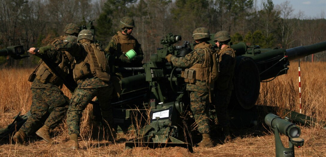 Marines with Sierra Battery, Battalion Landing Team, 3rd Battalion, 2nd Marine Regiment, 22nd Marine Expeditionary Unit, load an M777 155mm Howitzer cannon to fire in direct-fire mode aboard Fort Pickett, Va., Jan. 12, 2009. The 22nd MEU is aboard Fort Pickett conducting Realistic Urban Training in preparation for a spring deployment.  (Official Marine Corps photo by Staff Sgt. Matt Epright)