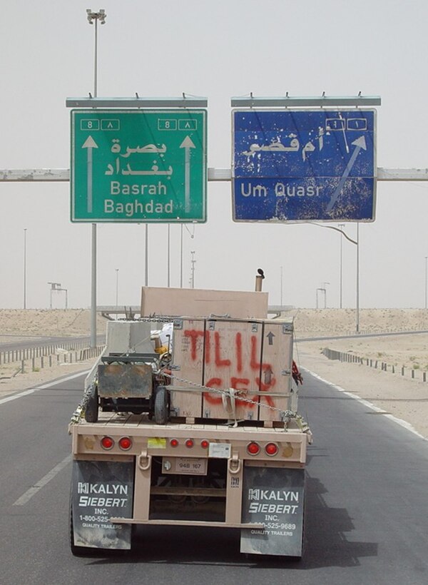 A semi-truck takes equipment and ordnance on a two-day convoy to Tallil, Iraq. (U.S. Air Force photos courtesy of TSgt. Mario Reyes)